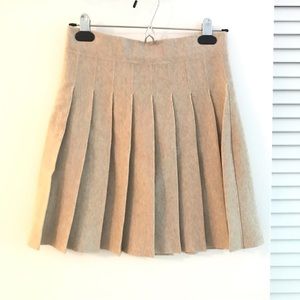 Beige pleated mini skirt